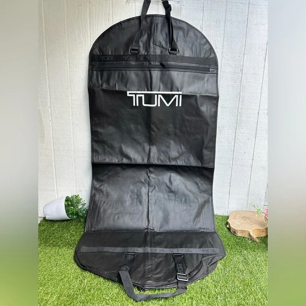 Tumi Travel Garment Bag black suits and dresses, during travel NEW 52” long 23”
